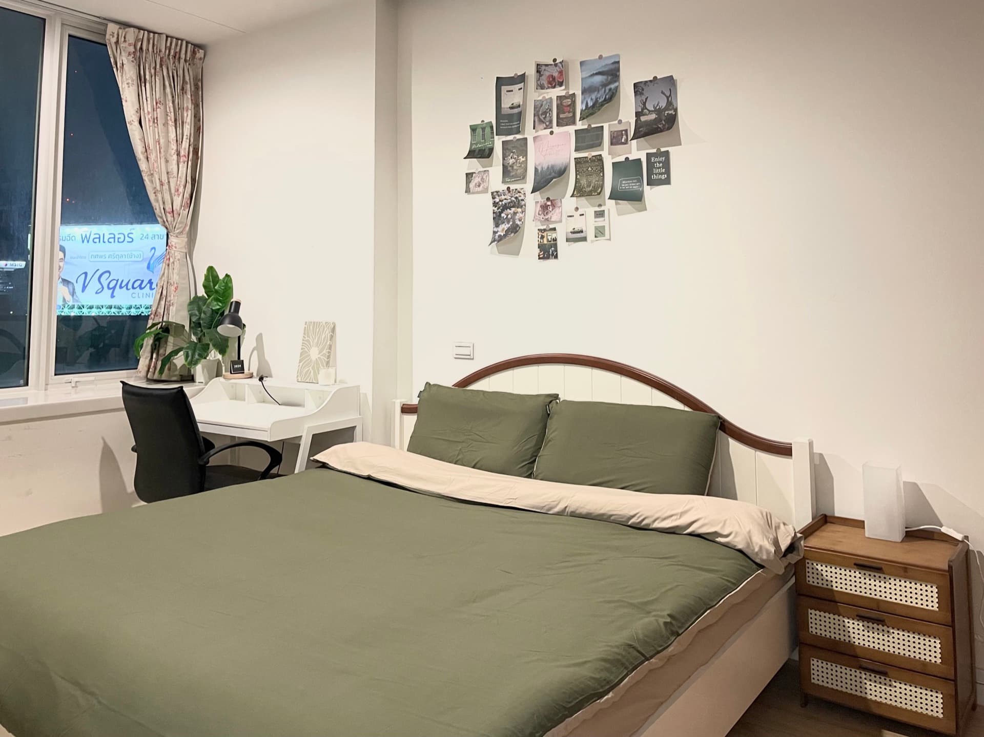 Second bedroom with olive-green bedding