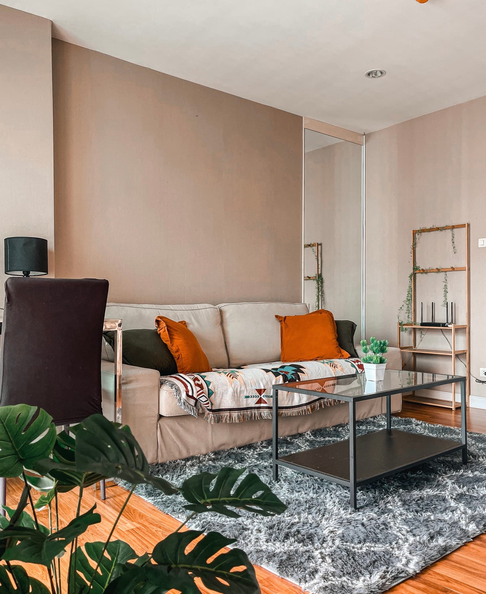 Warm living room with an olive-green sofa