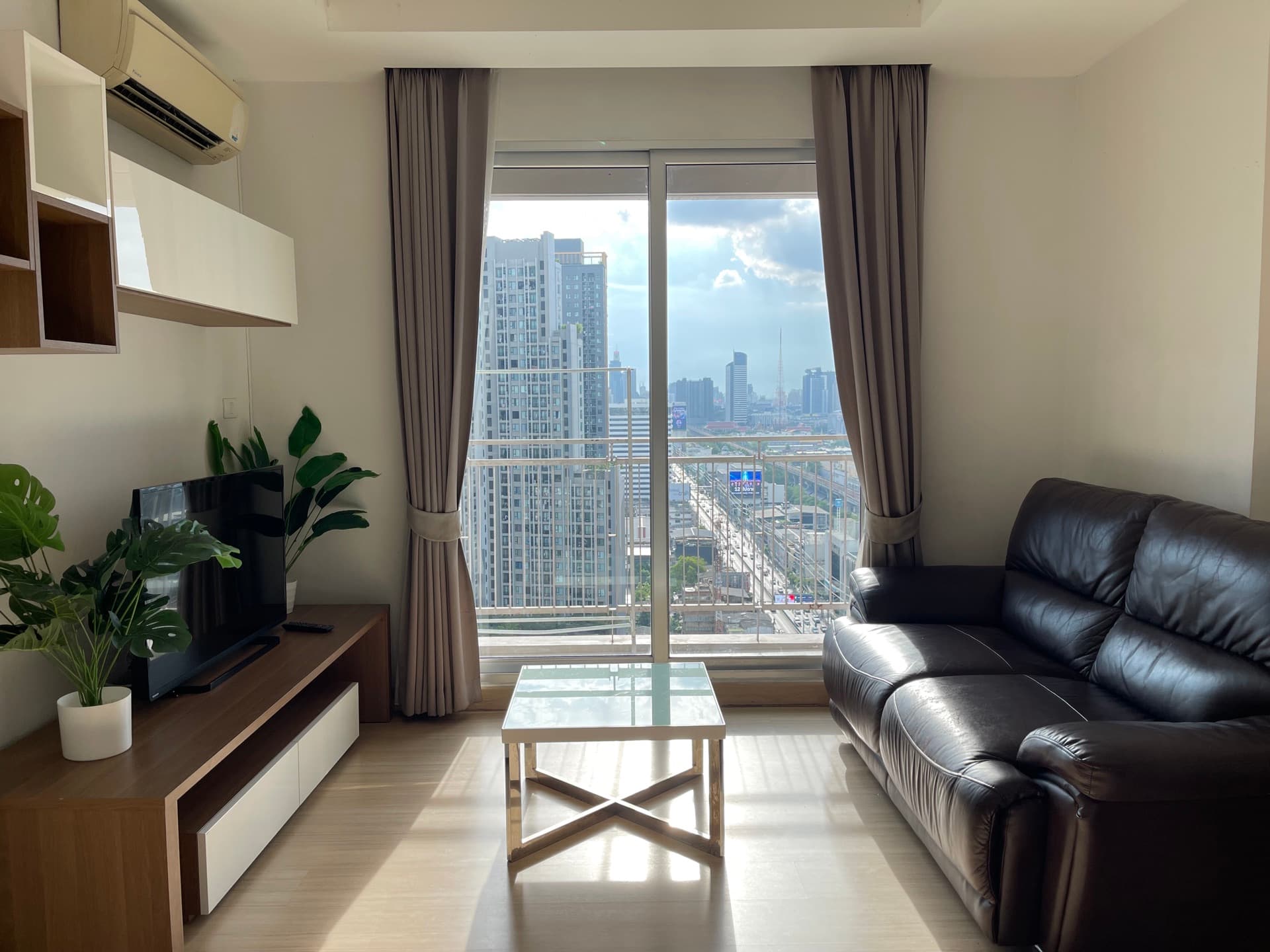 Living room with a sweeping city view