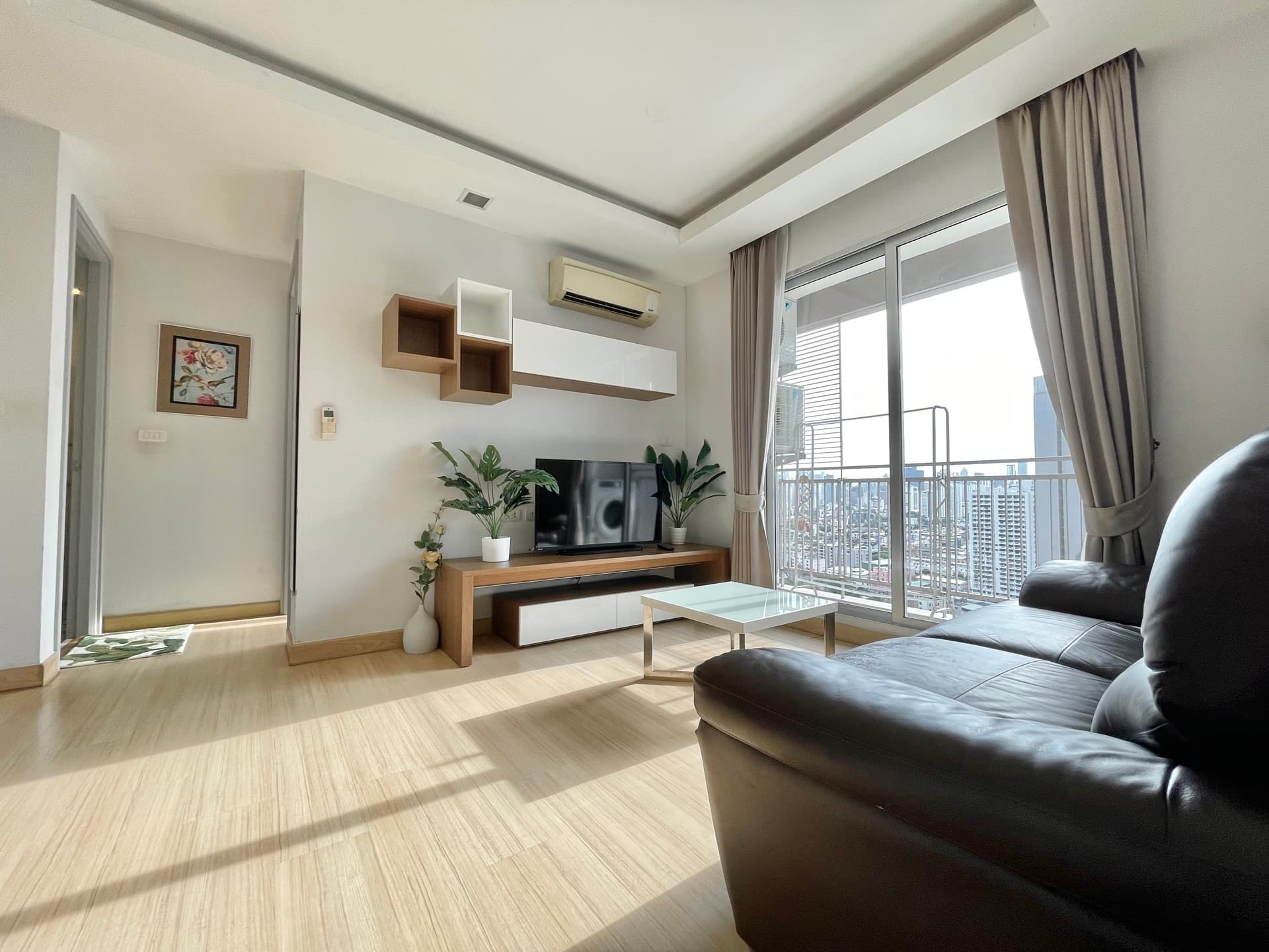 Living room with warm wood flooring